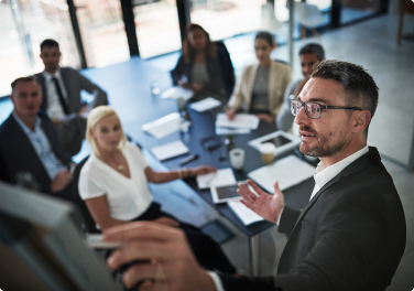 Colleagues meeting around a conference table