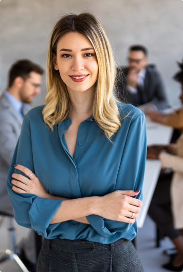 Confident professional standing in the office